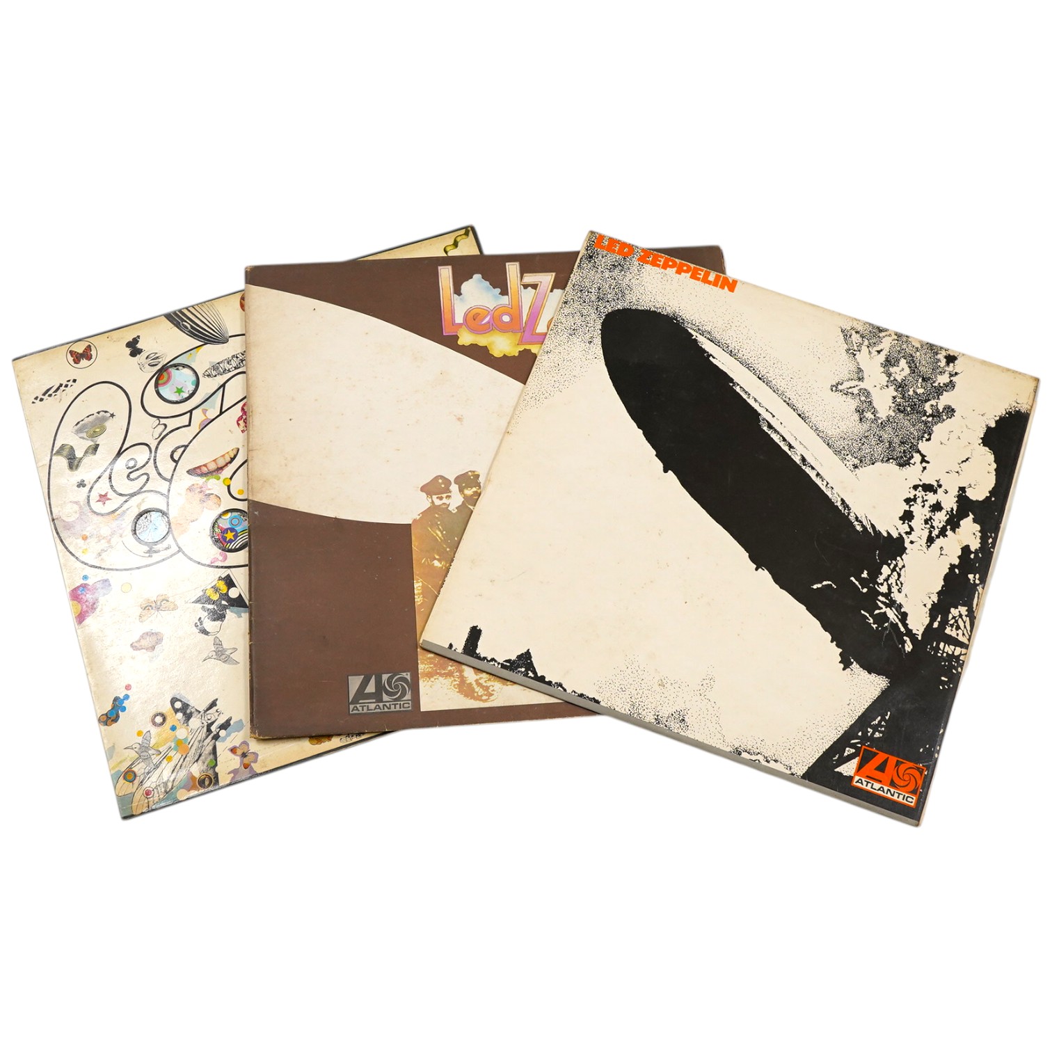Led Zeppelin; the first three LP record albums, all on red and plum Atlantic labels; Led Zeppelin I (588171), 588171 A1 / 588171 B4, Led Zeppelin II (588198), 588198 A2 / 588198 B2, Led Zeppelin III (2401002), 2401002 A5
